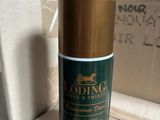 an image of a bottle of lotion sitting on top of a box