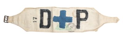 a picture of an old sign with a blue cross on it