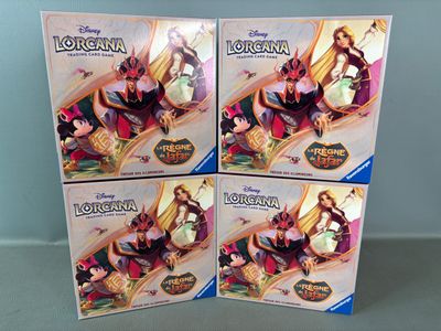 three boxed disney figurines of the princess and the frog