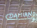 a close up of a sign on the side of a building