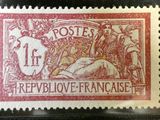 a stamp with a picture of a man and woman on it