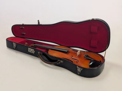 an image of a violin case with a violin inside of it