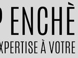 a black and white photo of a sign that says cap encheres