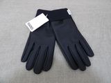 a pair of black leather gloves with a tag on them