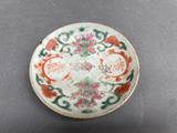 an image of a white plate with a floral design on it