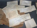 several papers are piled on top of each other on a table