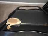 a piece of cake on the top of a black table