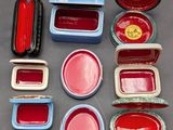 a lot of small red and blue containers on the table