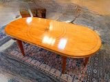 a wooden table with a circular design on top of it