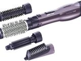 three different types of hair brushes and combs on a white background