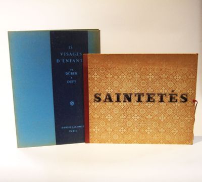 two books that are sitting next to each other on a table