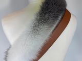 grey and white fur collar on a mannequin head