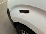 a sticker on the side of a white truck