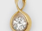 un pendentif en or jaune 18 carats et diamants