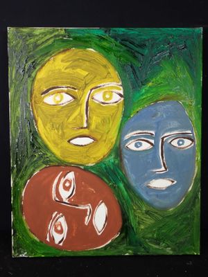 peinture représentant trois visages de couleurs différentes sur un fond noir