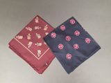pair of two red and blue handkerchiefs on a table
