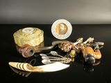 a black table topped with assorted items on top of a black table