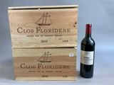 two wooden boxes with a bottle of wine and a bottle of wine