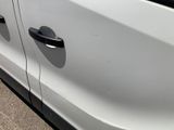 a close up of a car door handle on the side of the car
