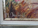 une photo d'un tableau représentant des fleurs, dans un cadre