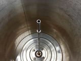 an image of a stainless steel bowl with a metal handle