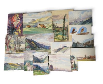 many paintings of different colors and sizes on the wall