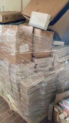 many boxes stacked on top of each other on a pallet