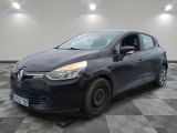 the black car is parked on a checkered floor in a garage