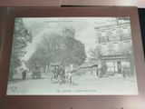 a black and white photo of a horse drawn carriage