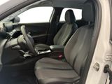 the interior of a car with two seats and a steering wheel