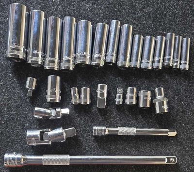 a lot of tools that are laying out on the floor