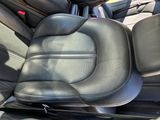 a close up view of a car ' s front seats