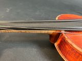 a violin that is sitting on a table