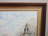 a picture of a painting hanging on a wall