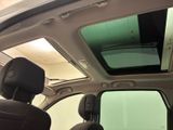 a view of the inside of a vehicle with the sunroof
