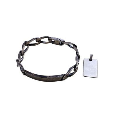 bracelet with a tag on it and a tag attached to it
