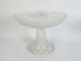a clear glass bowl with a decorative design on it