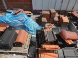 many different types of roof tiles on the ground