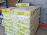 a stack of pallets sitting on top of a pallet in a warehouse