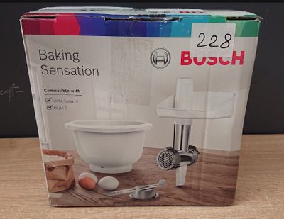packaging of a boxed box for a kitchen mixer on a wooden table