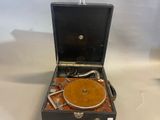 a black suitcase with a record player inside of it