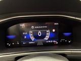 a close up of a car dashboard with a digital display