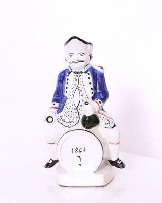 Pichet anthropomorphe dit JACQUOT en faïence et émaux polych…