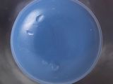 a picture of a blue bowl with water in it