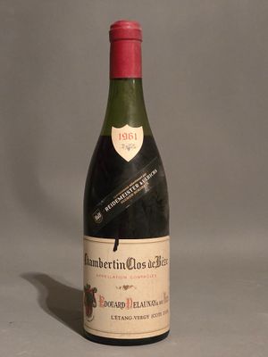 a bottle of wine that is sitting on a table
