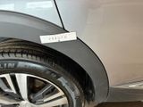 a close up of a car tire with a sticker on it