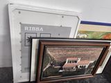 two framed pictures of a house and a picture of a house