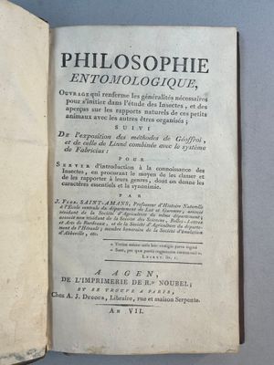 un livre ouvert sur lequel figure une illustration en noir et blanc représentant le titre d'un poème