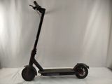 an electric scooter sitting on a white surface in front of a white backdrop