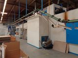a large room with a bunch of boxes on the floor